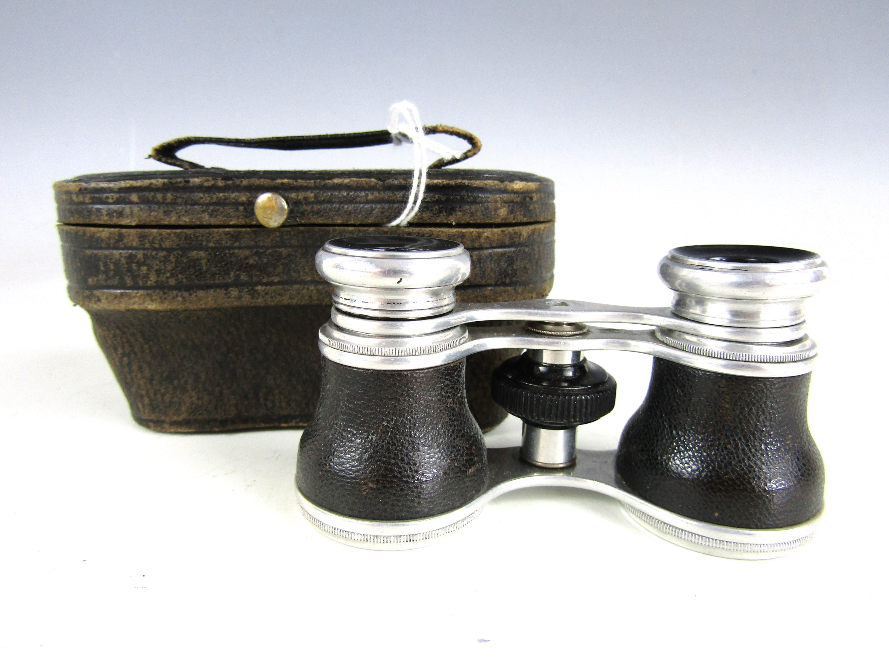 A vintage pair of cased opera glasses