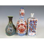 A Japanese cloisonné earthenware baluster vase, together with two Imari vases, respectively of