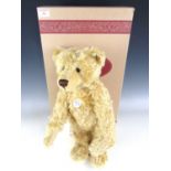 A Steiff 1905 Boy Teddy bear in blonde mohair with original carton and tags