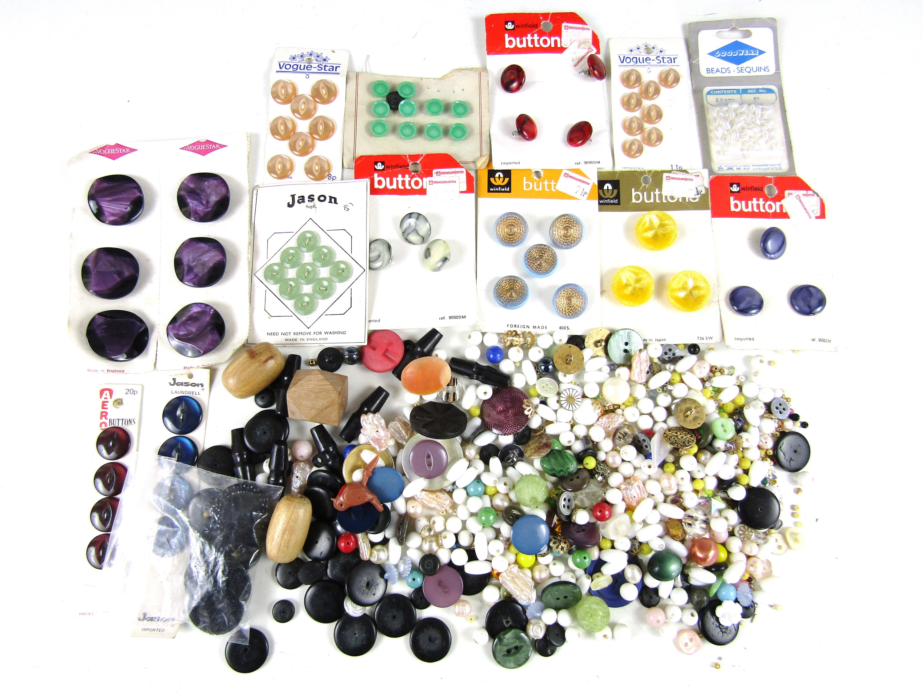 A large quantity of vintage beads and buttons