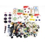 A large quantity of vintage beads and buttons