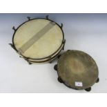 A vintage tambourine and drum