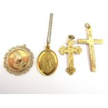A 9ct gold religious icon pendant, together with two rolled-gold cruciform pendants and a rolled-