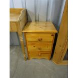 A contemporary pine three drawer bedside chest, 45 x 42 x 63 cm