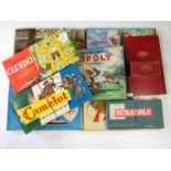 A quantity of vintage board games including Totopoly, Millionaire, Scoop, Go, Cluedo, Monopoly and