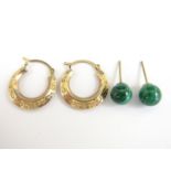 A pair of yellow metal half hoop earrings together with a pair of malachite stud earrings, 1.2 g