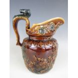 A late 19th Century Wood treacle glazed jug