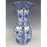 A 20th century blue and white lobed baluster vase 36 cm