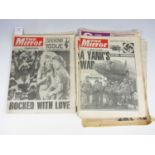 A quantity of vintage souvenir issue newspapers dating to the 1980s, including The Sun and The