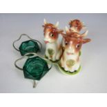 A novelty Hummel cruet set in the form of Jersey cows (a/f) together with a pair of glass salts