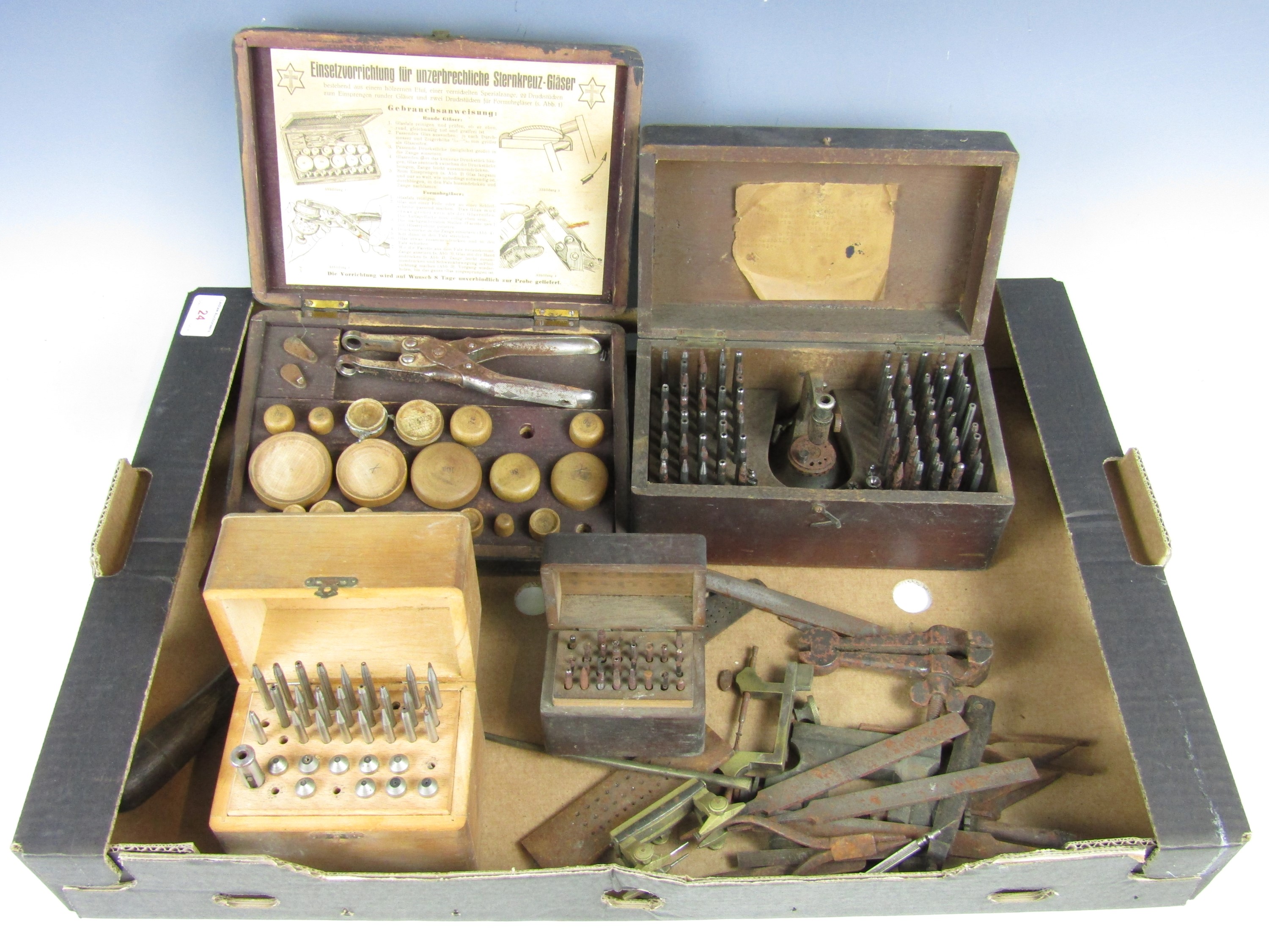 A large quantity of vintage watchmakers' tools including burrs etc.