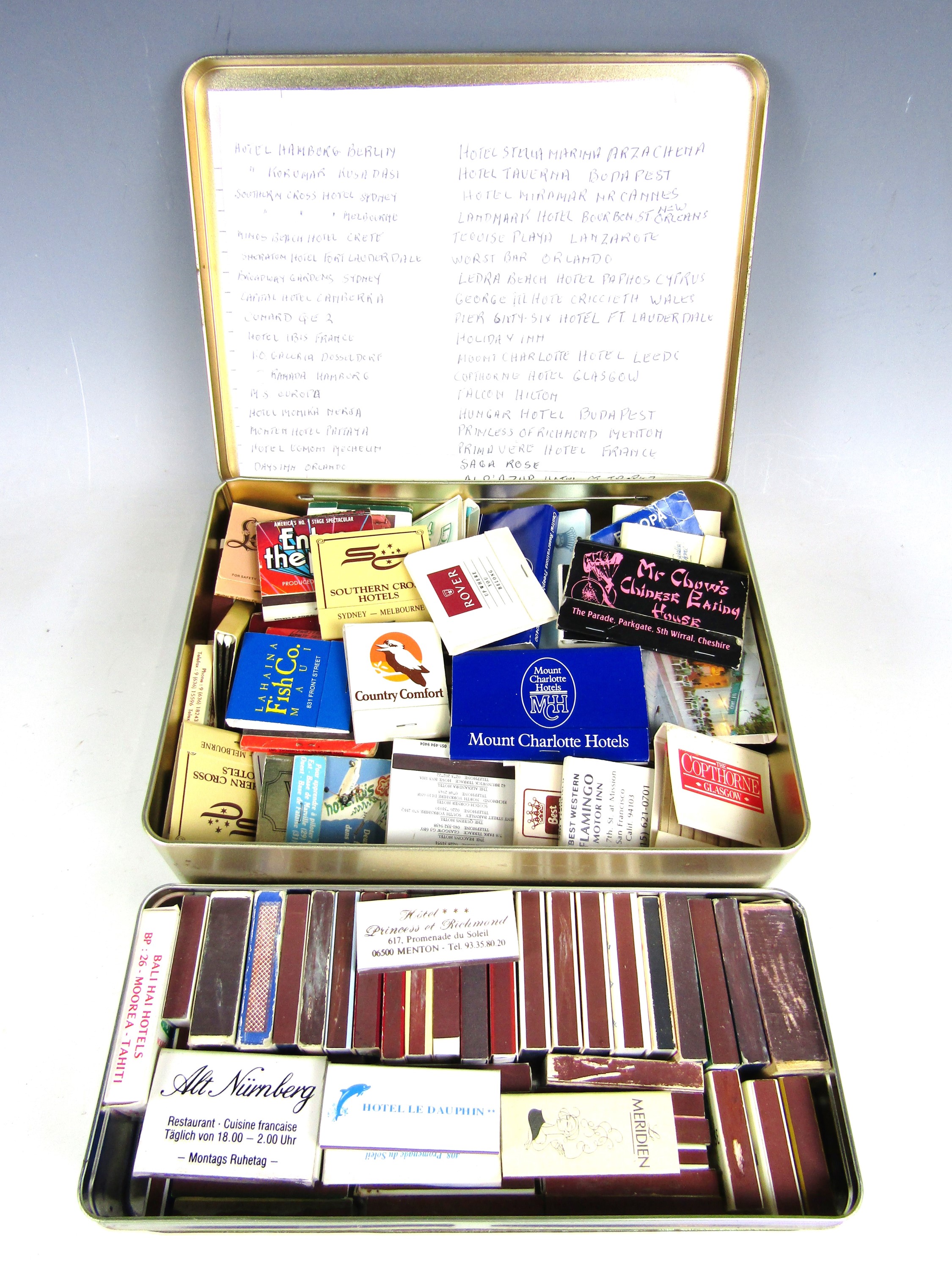 A large collection of vintage match boxes and match books