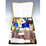 A large collection of vintage match boxes and match books