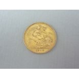 A 1913 gold half sovereign