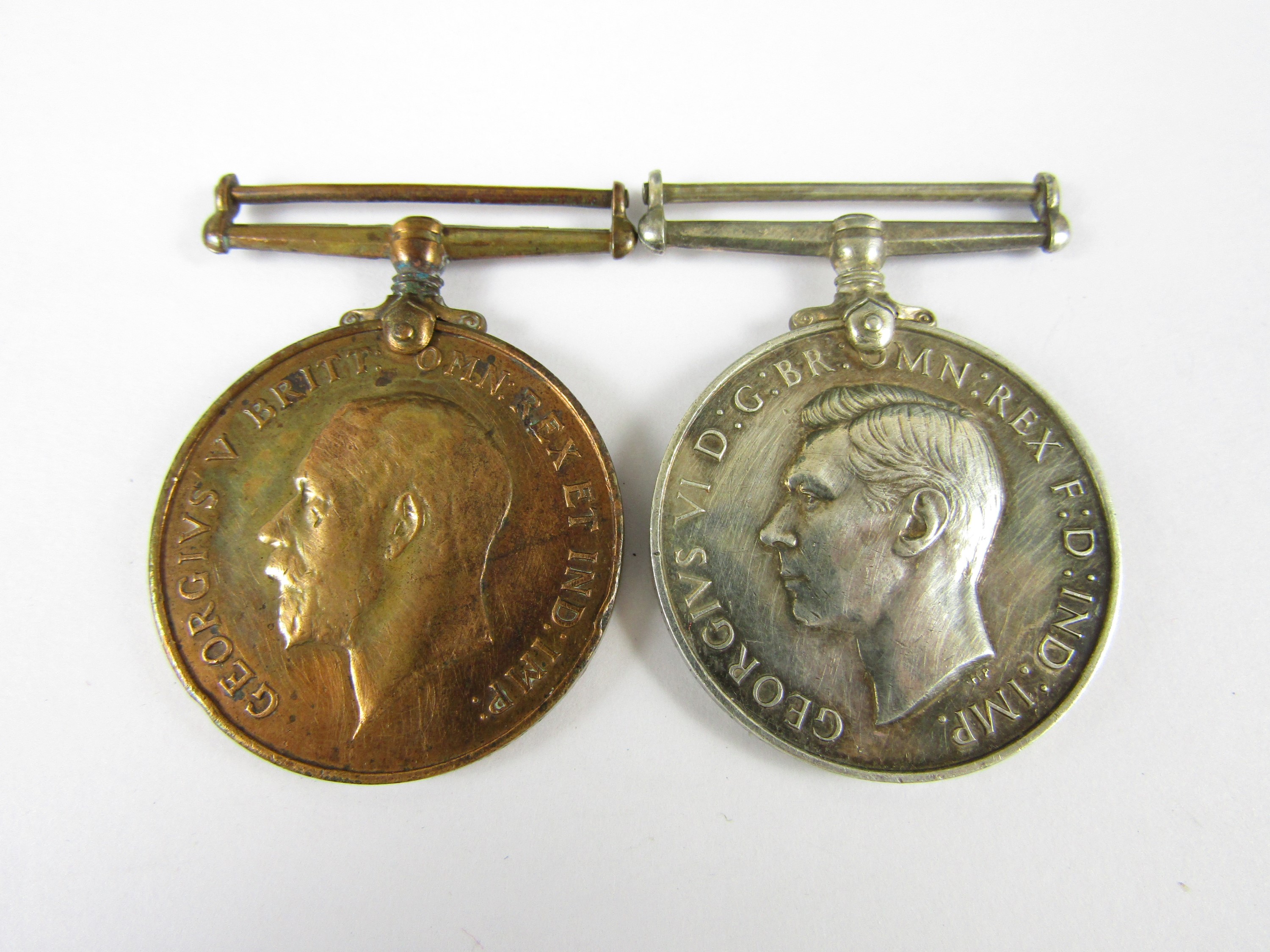 A George VI Naval Reserve Long Service Medal and Mercantile Marine Medal pair to 5883 D Thomas F