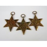 An Africa Star, engraved to 159329 Capt N C Gordon, R Signals, together with un-engraved Burma and