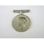 A George VI Naval Long Service Medal to KX 78750 W C Medland, S P O (TY) HMS Bradford
