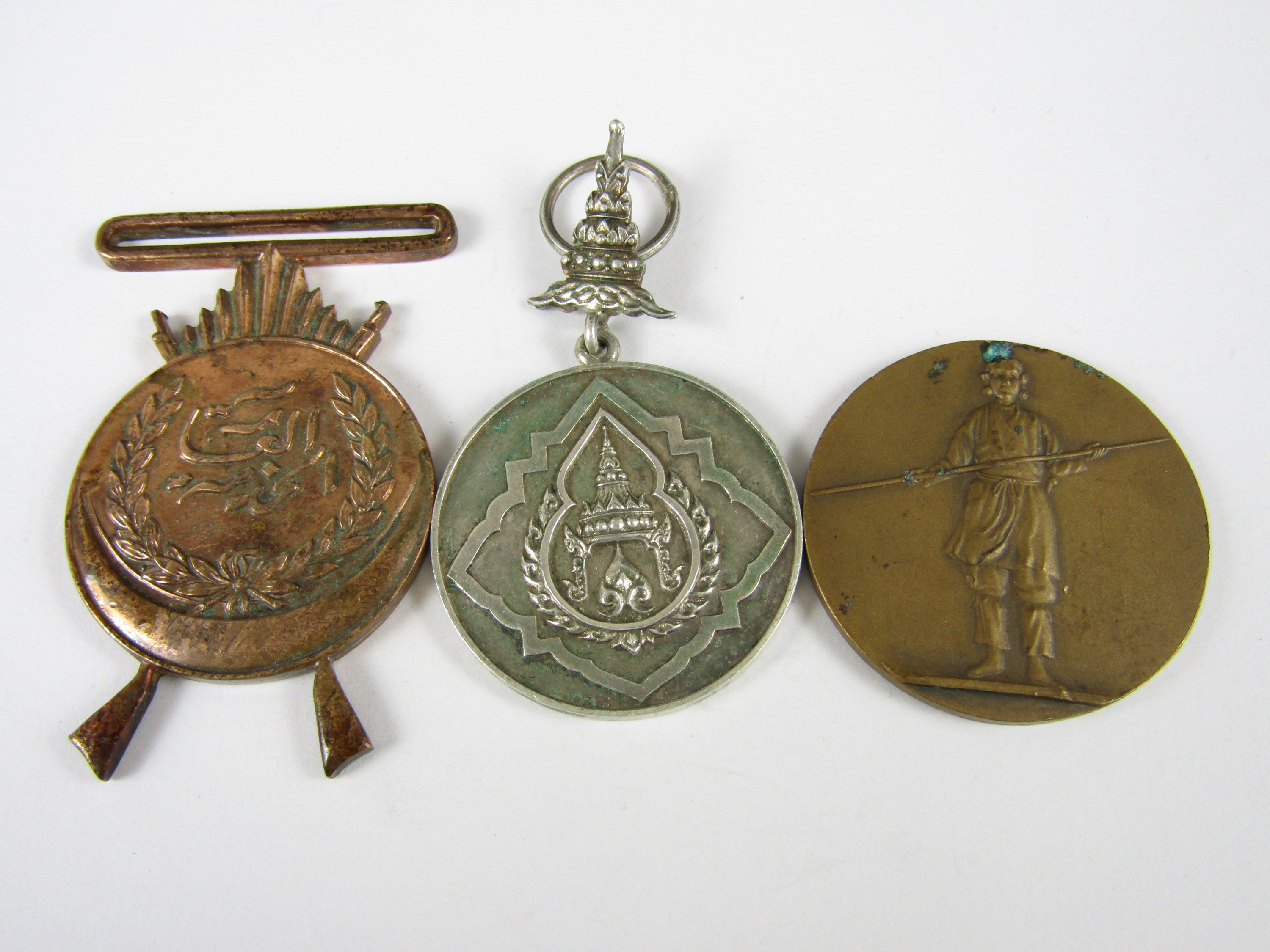 Three various Oriental / Eastern medals