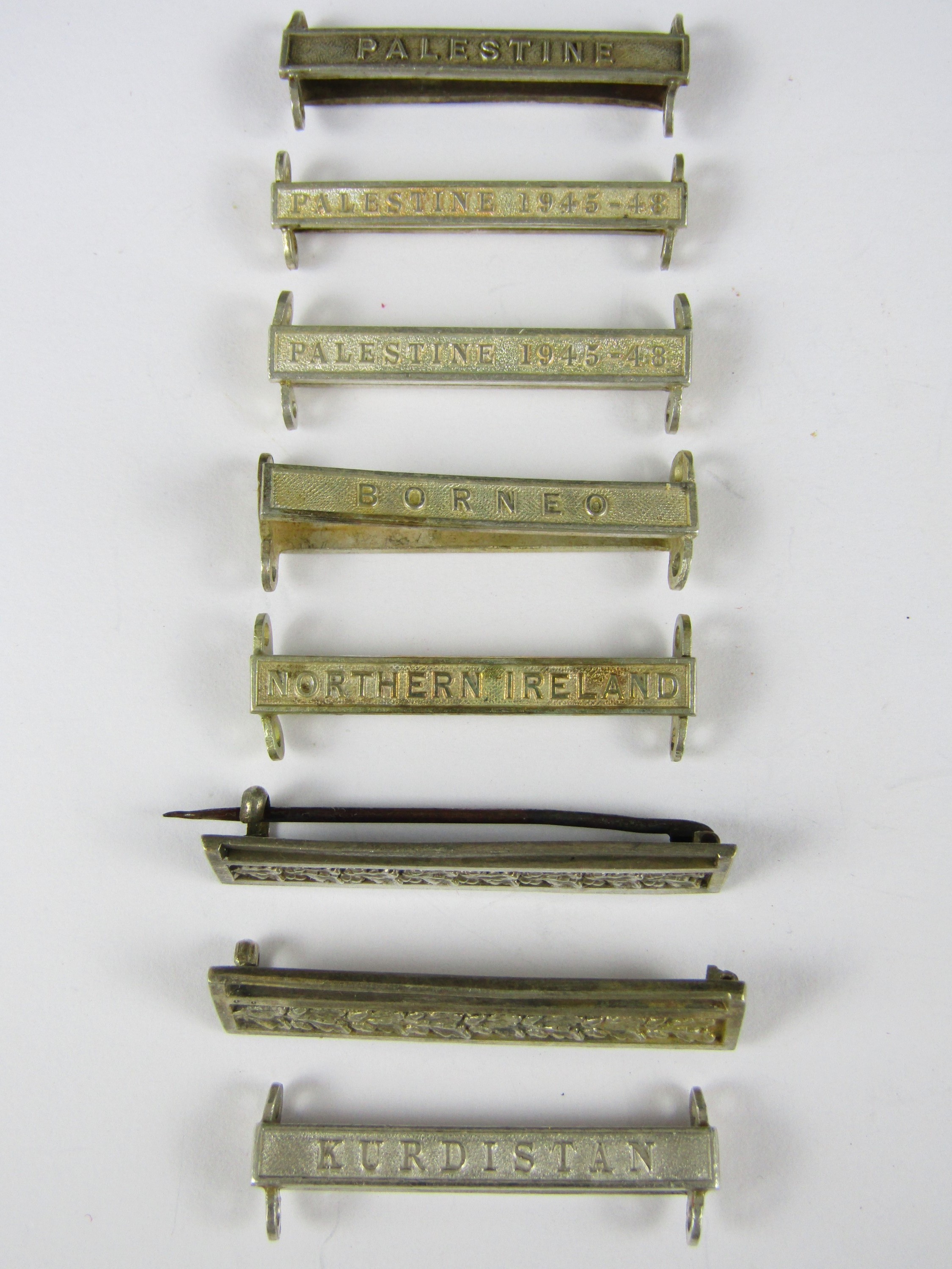 Two medal suspenders and various General Service Medal clasps