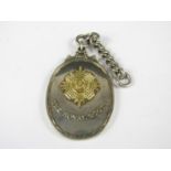 An Edwardian Royal Scots prize fob medallion awarded in the General Moncrief Cup, 1905, to Lance