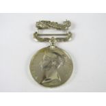 A Crimea Medal with loose Sebastopol clasp engraved to PRIE Gilbert Smith, 9th Foot