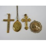 A 9ct gold religious icon pendant, 1.45 g, together with two rolled gold cruciform pendants and a