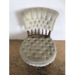 A Victorian upholstered walnut nursing chair