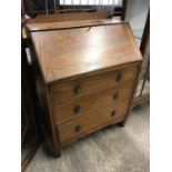 An oak fall-front bureau, second quarter 20th century