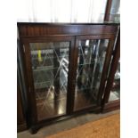 A glazed reproduction mahogany display cabinet, 88 x 32 x 112 cm