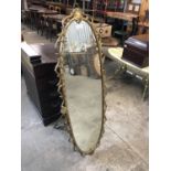 A large gilt freestanding mirror, 122 cm