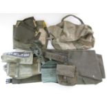 A quantity of post-War military kit including a tropical Bren cover, folding saw, gun slips etc
