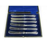 A cased set of six silver handled tea knives