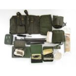 A quantity of military gun cleaning tools etc