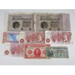 Three Queen Elizabeth II Bank of England 10 Shilling notes together with other foreign notes