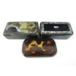 Three 19th century lacquered snuff boxes, one depicting a female nude