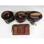 Sundry leather belts and a pouch