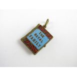 A miniature novelty fob in the form of a book entitled The Royal Family