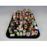 A large quantity of vintage novelty salt and pepper shakers including military figures, snowmen