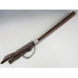 A military truncheon and carrier