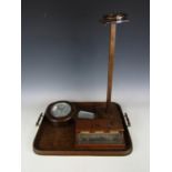Four items of George V oak comprising banjo barometer, smokers' stand, an inkstandish and tray