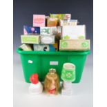 A large quantity of Avon boxed bottles including children's themes, pomanders etc