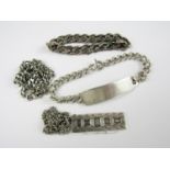 A silver ingot necklace together with a silver identity bracelet, a silver faceted belcher link neck