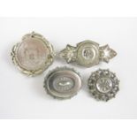 Four Victorian white metal brooches, test as silver, 20.6g