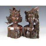 A pair of Balinese busts (one a/f)