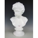 A plaster of Paris bust of a young boy, 47 cm