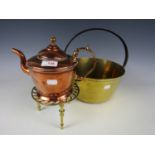 A brass jam pan together with a teapot and trivet