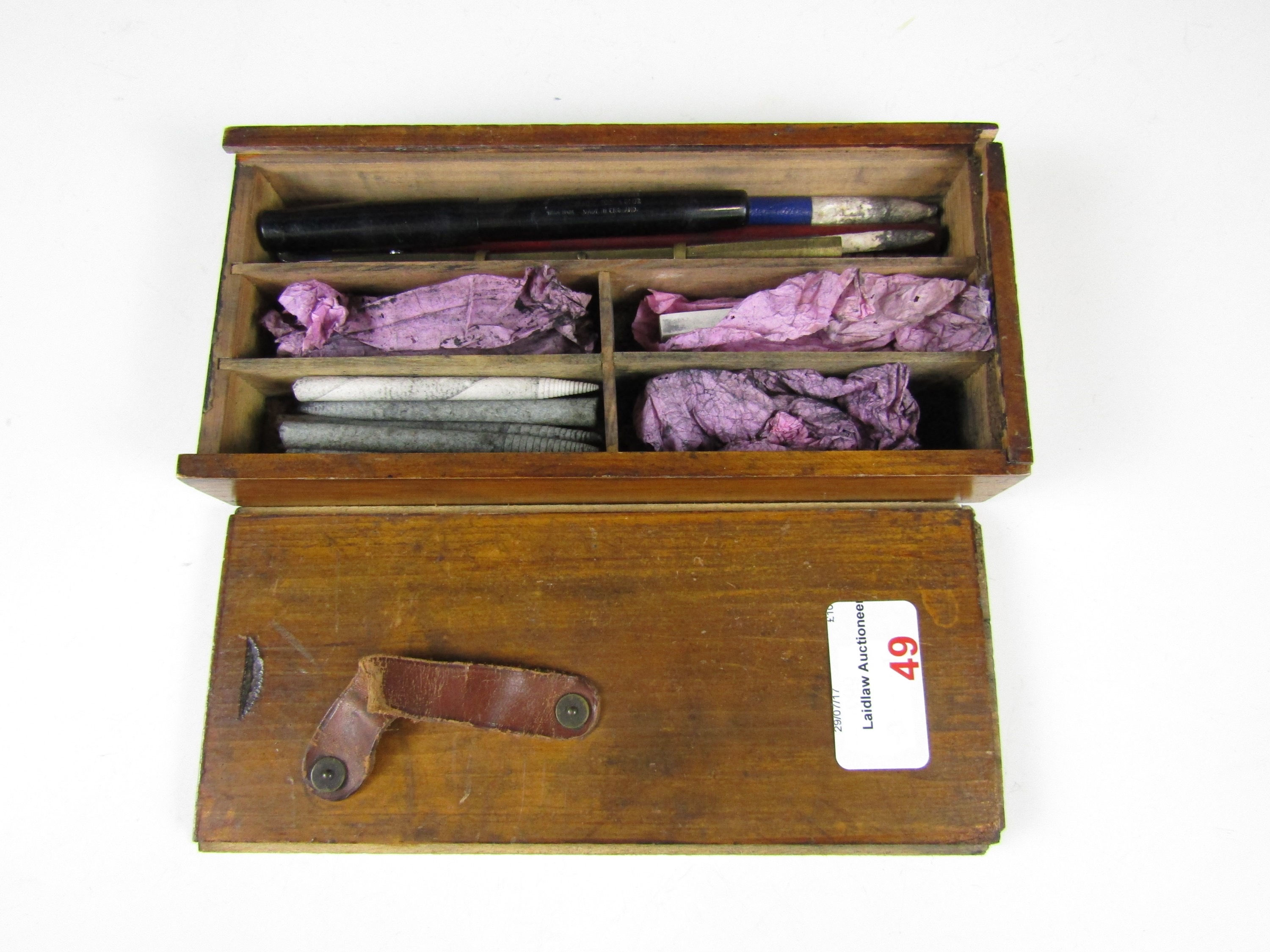 A charcoal pencil set in period wooden box