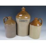 A large Booth and Co Botanical Brewers, Leeds, stoneware flagon, together with two others