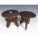 A pair of small carved Indian tables