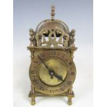A Smiths brass lantern clock